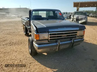 1990 Ford F-150 "S" with VIN 1FTDF15Y8LNA66730, listed as a Copart auction lot 72320024 with 41,844 mi miles and Salvage Title. Bid and sale history available at carsss.com. Image 11.