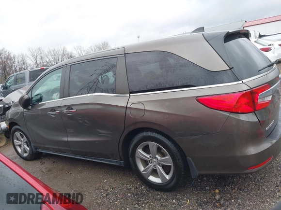 2018 Honda Odyssey EX-L with VIN 5FNRL6H72JB081086, listed as a IAAI auction lot 41031370 with 73,907 mi miles and . Bid and sale history available at DreamBid. Image 14.