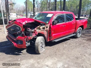 2019 Toyota Tacoma 4WD SR with VIN 3TMCZ5ANXKM279726, listed as a IAAI auction lot 41811749 with 56,017 mi miles. Bid and sale history available at carsss.com. Image 18.