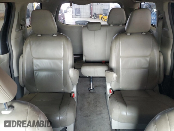 2015 Toyota Sienna Limited z VIN 5TDDK3DCXFS104812, wystawiony jako Copart lot #64131875 z przebiegiem 145 000 mil mil oraz Szkoda całkowita • Salvage title. Historia ofert i sprzedaży dostępna na DreamBid. Obrazek 10.