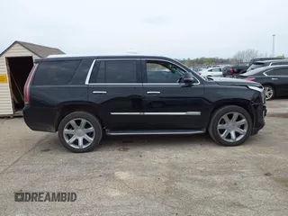 2018 Cadillac Escalade Premium Luxury z VIN 1GYS4CKJ2JR139591, wystawiony jako IAAI lot #42062606 z przebiegiem 117 558 mil mil oraz . Historia ofert i sprzedaży dostępna na DreamBid. Obrazek 13.