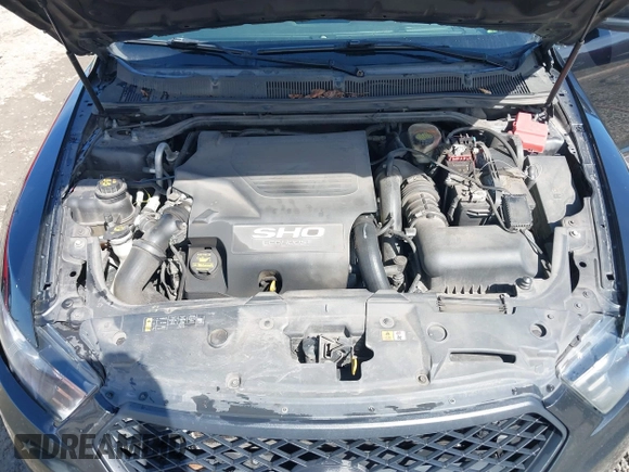 2013 Ford Taurus SHO z VIN 1FAHP2KT9DG164190, wystawiony jako IAAI lot #41743345 z przebiegiem 191 568 mil mil oraz . Historia ofert i sprzedaży dostępna na DreamBid. Obrazek 10.