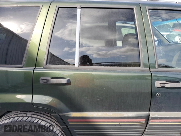 1995 Jeep Grand Cherokee Limited with VIN 1J4GZ78Y4SC788283, listed as a Copart auction lot 47796545 with 283,087 mi miles and Salvage Title. Bid and sale history available at carsss.com. Image 11.