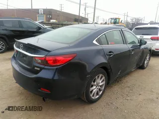 2015 Mazda 6 i Sport with VIN JM1GJ1U51F1185105, listed as a IAAI auction lot 41287570 with 133,016 mi miles and . Bid and sale history available at carsss.com. Image 4.