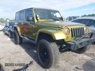 2008 Jeep Wrangler Unlimited Sahara with VIN 1J4GB59198L557981, listed as a IAAI auction lot 42182733 with 201,484 mi miles and . Bid and sale history available at DreamBid. Image 1.