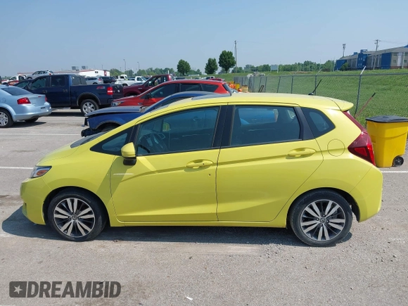 2015 Honda Fit EX-L z VIN 3HGGK5H84FM717976, wystawiony jako IAAI lot #42451573 z przebiegiem 110 963 mil mil oraz . Historia ofert i sprzedaży dostępna na DreamBid. Obrazek 14.