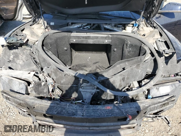 2014 Tesla Model S 60 with VIN 5YJSA1H13EFP38425, listed as a Copart auction lot 63686205 with 183,968 mi miles and Salvage title. Bid and sale history available at DreamBid. Image 11.