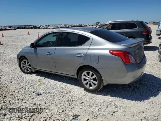 2014 Nissan Versa S with VIN 3N1CN7AP1EL841096, listed as a Copart auction lot 54109125 with 117,354 mi miles and Salvage Title. Bid and sale history available at carsss.com. Image 2.