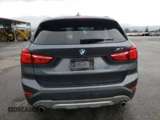 2018 BMW X1 xDrive28i with VIN WBXHT3C33J5K23187, listed as a Copart auction lot 71063192 with 97,403 mi miles. Bid and sale history available at carsss.com. Image 6.