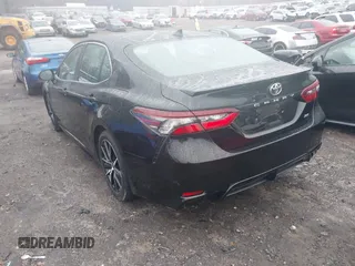 2023 Toyota Camry SE z VIN 4T1G11AK0PU809322, wystawiony jako IAAI lot #41056512 z przebiegiem 33 159 mil mil oraz . Historia ofert i sprzedaży dostępna na DreamBid. Obrazek 3.