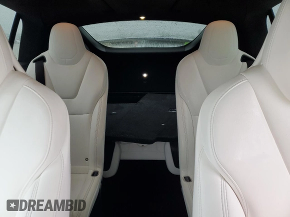 2017 Tesla Model X 90D z VIN 5YJXCBE22HF076134, wystawiony jako Copart lot #41828555 z przebiegiem 214 443 mil mil oraz Szkody całkowita. Historia ofert i sprzedaży dostępna na DreamBid. Obrazek 10.