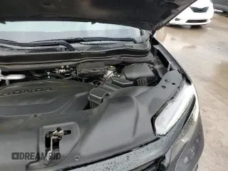 2021 Honda Passport Sport z VIN 5FNYF7H23MB014465, wystawiony jako Copart lot #60483005 z przebiegiem 46 533 mil mil oraz Szkoda całkowita • Salvage title. Historia ofert i sprzedaży dostępna na DreamBid. Obrazek 14.