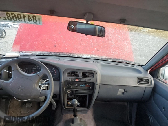1994 Nissan Frontier with VIN 1N6SD11SXRC360680, listed as a Copart auction lot 84196824 with 105,338 mi miles and Salvage title. Bid and sale history available at DreamBid. Image 8.
