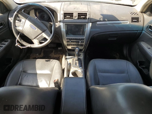 2012 Ford Fusion Hybrid with VIN 3FADP0L33CR258753, listed as a Copart auction lot 74201724 with 158,434 mi miles and Salvage title. Bid and sale history available at DreamBid. Image 8.