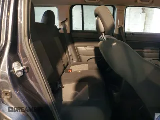 2014 Jeep Patriot Sport with VIN 1C4NJPBB4ED814453, listed as a Copart auction lot 52360025 with 110,848 mi miles and Salvage Title. Bid and sale history available at carsss.com. Image 11.