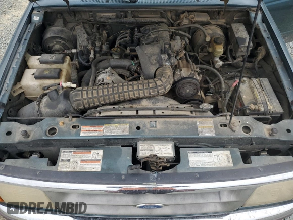 1997 Ford Ranger XLT with VIN 1FTCR11X2VTA87152, listed as a Copart auction lot 81559504 with 261,925 mi miles and Salvage title. Bid and sale history available at DreamBid. Image 11.