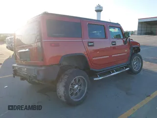 2003 Hummer H2 with VIN 5GRGN23U43H101959, listed as a IAAI auction lot 41771430 with 162,272 mi miles. Bid and sale history available at carsss.com. Image 4.