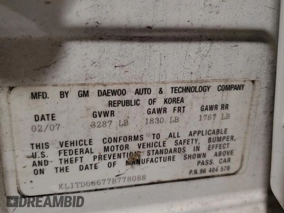 2007 Chevrolet Aveo LS with VIN KL1TD66677B778088, listed as a Copart auction lot 62846275 with Not provided miles and Salvage title. Bid and sale history available at DreamBid. Image 13.