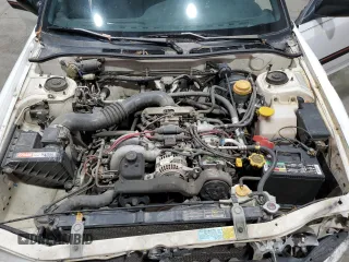 1994 Subaru Legacy L with VIN 4S3BJ6335R9948773, listed as a Copart auction lot 77018384 with 189,202 mi miles and Clean title. Bid and sale history available at DreamBid. Image 14.