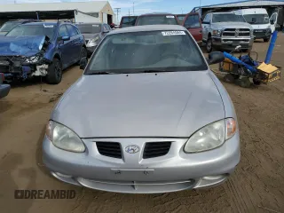 1999 Hyundai Elantra z VIN KMHJF25F8XU852123, wystawiony jako Copart lot #72284584 z przebiegiem 12 750 mil mil oraz Czysty tytuł • Clean title. Historia ofert i sprzedaży dostępna na DreamBid. Obrazek 5.