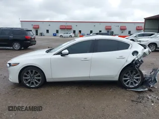 2023 Mazda 3 S Premium with VIN 3MZBPBDM6PM371326, listed as a IAAI auction lot 42138373 with 24,865 mi miles and . Bid and sale history available at DreamBid. Image 14.