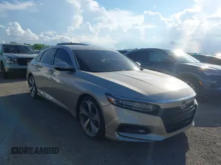 2020 Honda Accord Touring with VIN 1HGCV2F99LA029545, listed as a IAAI auction lot 40472177 with 44,960 mi miles and . Bid and sale history available at DreamBid. Image 1.
