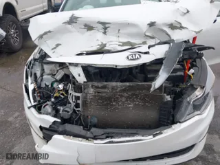 2016 Kia Optima EX with VIN 5XXGU4L30GG120518, listed as a IAAI auction lot 41602190 with 116,268 mi miles. Bid and sale history available at carsss.com. Image 10.