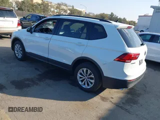 2020 Volkswagen Tiguan S z VIN 3VV1B7AX4LM098567, wystawiony jako IAAI lot #41504191 z przebiegiem 106 012 mil mil oraz . Historia ofert i sprzedaży dostępna na DreamBid. Obrazek 3.