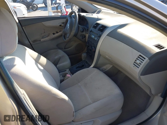 2009 Toyota Corolla with VIN 1NXBU40E59Z164488, listed as a IAAI auction lot 40907058 with 180,161 mi miles. Bid and sale history available at carsss.com. Image 5.