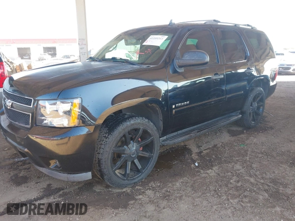 2007 Chevrolet Tahoe LS with VIN 1GNFC13C07J400472, listed as a IAAI auction lot 42209311 with 212,924 mi miles and . Bid and sale history available at DreamBid. Image 2.