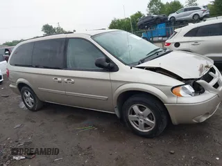 2005 Dodge Caravan SXT z VIN 2D4GP44L05R599391, wystawiony jako IAAI lot #42371619 z przebiegiem 116 468 mil mil oraz . Historia ofert i sprzedaży dostępna na DreamBid. Obrazek 13.