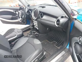 2010 MINI Hardtop S with VIN WMWMF7C55ATW88946, listed as a IAAI auction lot 42443200 with 104,953 mi miles and . Bid and sale history available at DreamBid. Image 5.