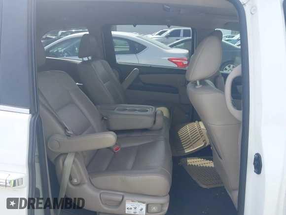 2012 Honda Odyssey EX-L with VIN 5FNRL5H65CB082916, listed as a IAAI auction lot 42052713 with 217,267 mi miles and . Bid and sale history available at carsss.com. Image 8.