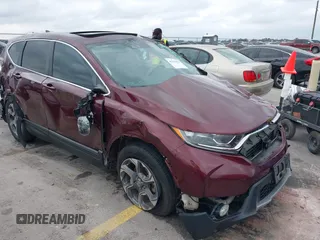 2019 Honda CR-V EX-L with VIN 7FARW1H83KE017311, listed as a IAAI auction lot 41513670 with 87,196 mi miles. Bid and sale history available at carsss.com. Image 1.