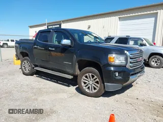 2015 GMC Canyon 2WD SLT with VIN 1GTG5CE35F1249224, listed as a IAAI auction lot 41697796 with 180,230 mi miles. Bid and sale history available at carsss.com. Image 1.