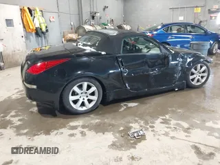 2004 Nissan 350Z Touring with VIN JN1AZ36AX4T014409, listed as a IAAI auction lot 41610945 with 86,756 mi miles. Bid and sale history available at carsss.com. Image 4.