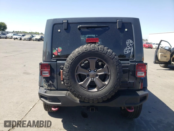 2018 Jeep Wrangler Unlimited Rubicon Recon с VIN 1C4BJWFG4JL806758, выставлен на аукционе Copart как лот 62555625 с пробегом 142 527 миль миль и Списание • Salvage title. История ставок и продаж доступна на DreamBid. Изображение 6.