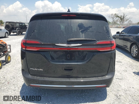 2023 Chrysler Pacifica Touring L с VIN 2C4RC1BG0PR606557, выставлен на аукционе Copart как лот 57833105 с пробегом 18 551 миль миль и Списание • Salvage title. История ставок и продаж доступна на DreamBid. Изображение 6.