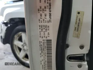 2011 Jeep Patriot Sport with VIN 1J4NT1GA4BD263521, listed as a Copart auction lot 54666735 with 176,606 mi miles and Salvage title. Bid and sale history available at DreamBid. Image 12.