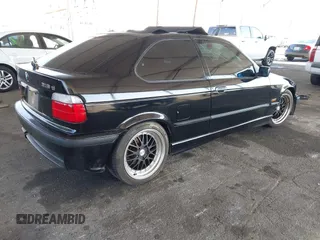 1996 BMW 3-Series 318TI with VIN WBACG8324TAU38424, listed as a IAAI auction lot 41529537 with 160,199 mi miles. Bid and sale history available at carsss.com. Image 4.