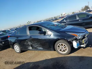 2021 Toyota Prius L Eco z VIN JTDKAMFU1M3134107, wystawiony jako IAAI lot #41763080 z przebiegiem 185 248 mil mil oraz . Historia ofert i sprzedaży dostępna na DreamBid. Obrazek 14.