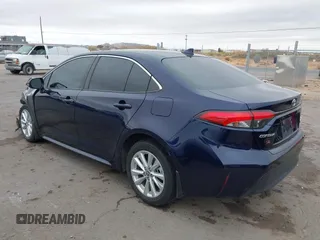 2023 Toyota Corolla Hybrid LE with VIN JTDBCMFE8PJ003081, listed as a IAAI auction lot 41041004 with 19,146 mi miles. Bid and sale history available at carsss.com. Image 3.