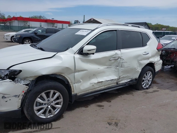 2017 Nissan Rogue S with VIN 5N1AT2MM3HC794051, listed as a IAAI auction lot 42063921 with 129,586 mi miles and . Bid and sale history available at DreamBid. Image 6.