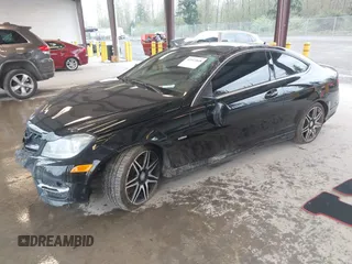2014 Mercedes-Benz C-Class C 250 with VIN WDDGJ4HBXEG169195, listed as a IAAI auction lot 42013848 with 95,345 mi miles. Bid and sale history available at carsss.com. Image 2.