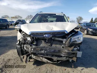 2017 Subaru Forester Touring with VIN JF2SJGWC4HH527716, listed as a Copart auction lot 47662705 with 61,901 mi miles and Salvage Title. Bid and sale history available at carsss.com. Image 5.