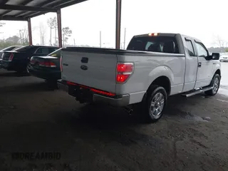 2011 Ford F-150 XL with VIN 1FTFX1CT6BFC10586, listed as a IAAI auction lot 41613825 with 124,854 mi miles. Bid and sale history available at carsss.com. Image 4.