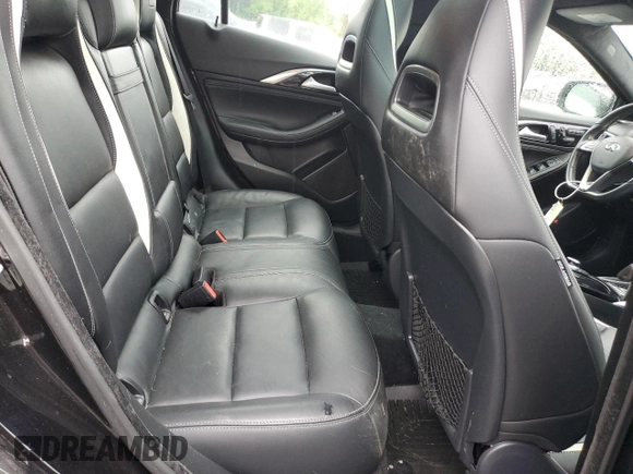 2018 Infiniti QX30 Luxury z VIN SJKCH5CP7JA042766, wystawiony jako Copart lot #57026685 z przebiegiem 66 525 mil mil oraz Szkoda całkowita • Salvage title. Historia ofert i sprzedaży dostępna na DreamBid. Obrazek 10.