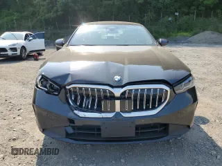 2024 BMW 5 Series 530i xDrive with VIN WBA53FJ04RCP87607, listed as a Copart auction lot 58768065 with 11,596 mi miles and Salvage title. Bid and sale history available at DreamBid. Image 5.