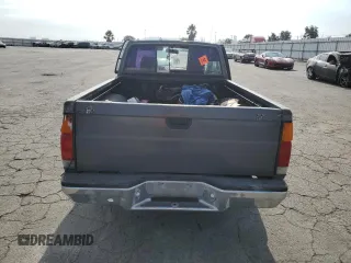 1989 Nissan Hardbody z VIN 1N6ND16S2KC377484, wystawiony jako Copart lot #65412324 z przebiegiem 31 573 mil mil oraz Szkody całkowita. Historia ofert i sprzedaży dostępna na DreamBid. Obrazek 6.