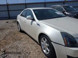 2008 Cadillac CTS AWD with VIN 1G6DG577X80139631, listed as a IAAI auction lot 41813311 with 208,723 mi miles and . Bid and sale history available at carsss.com. Image 6.